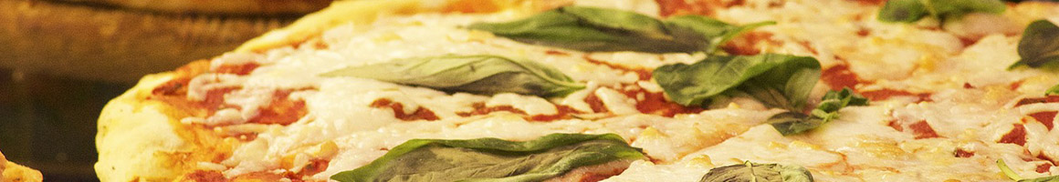 Eating Italian Pizza Sandwich at Upper Crust Pizza & Pasta restaurant in Santa Cruz, CA.